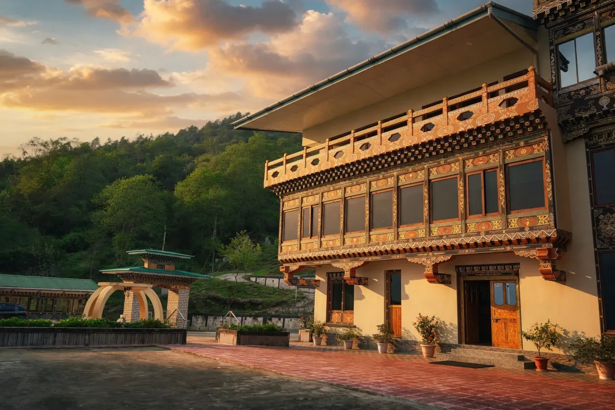The decorated facade and entrance courtyard at Norbu Lingka Resort, Trongsa