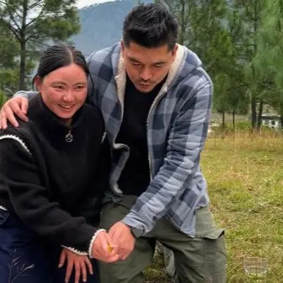 Two colleagues during an outdoor team activity